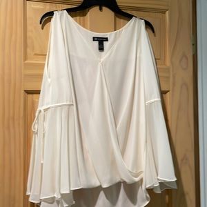 Womens cold shoulder blouse. Creamy white